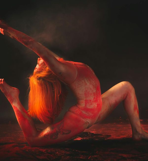 A person in a dynamic yoga stretch, showing fluidity and strength.